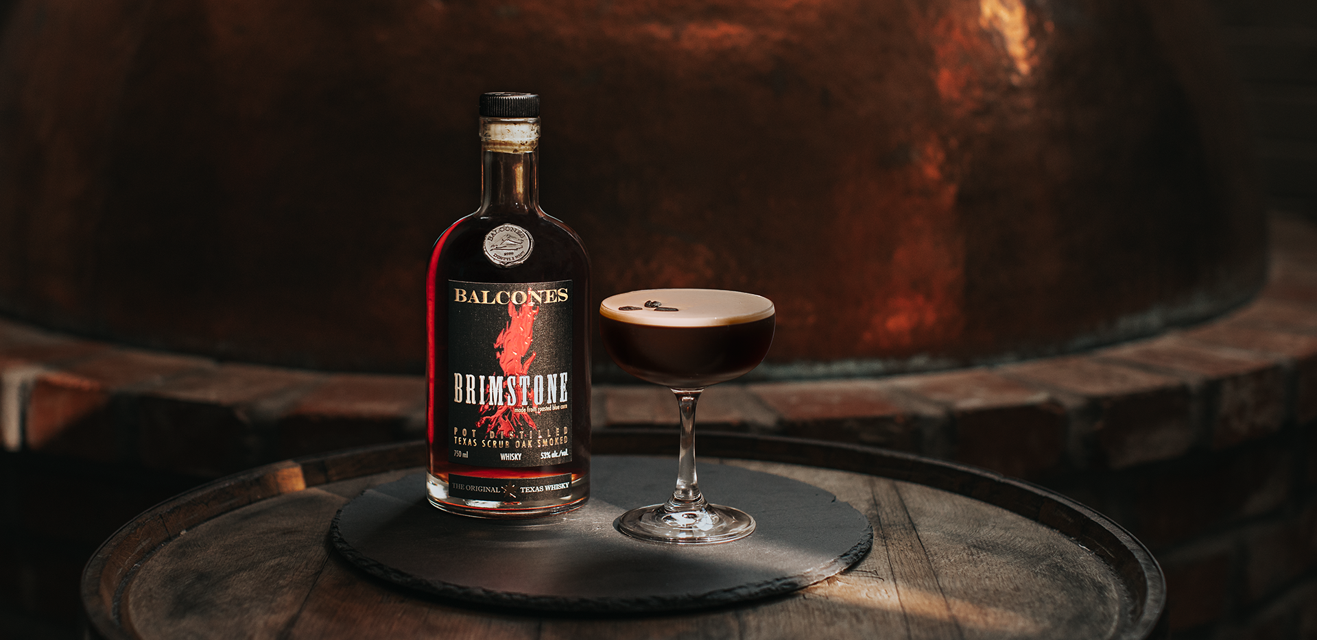 Bottle of Brimstone Smoked Whisky with Espresso Martinis on Table