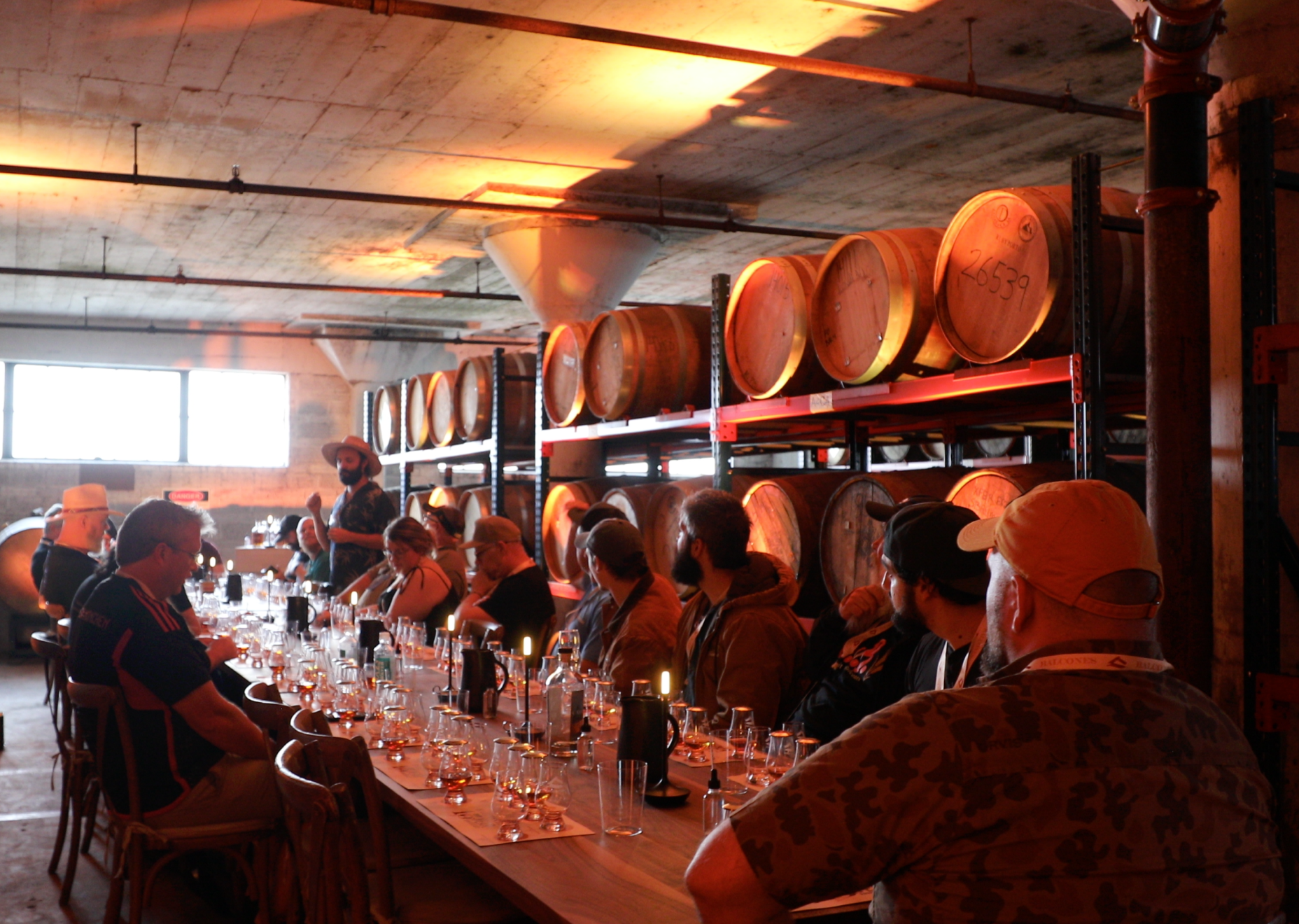 Tasting taking place in the barrel room