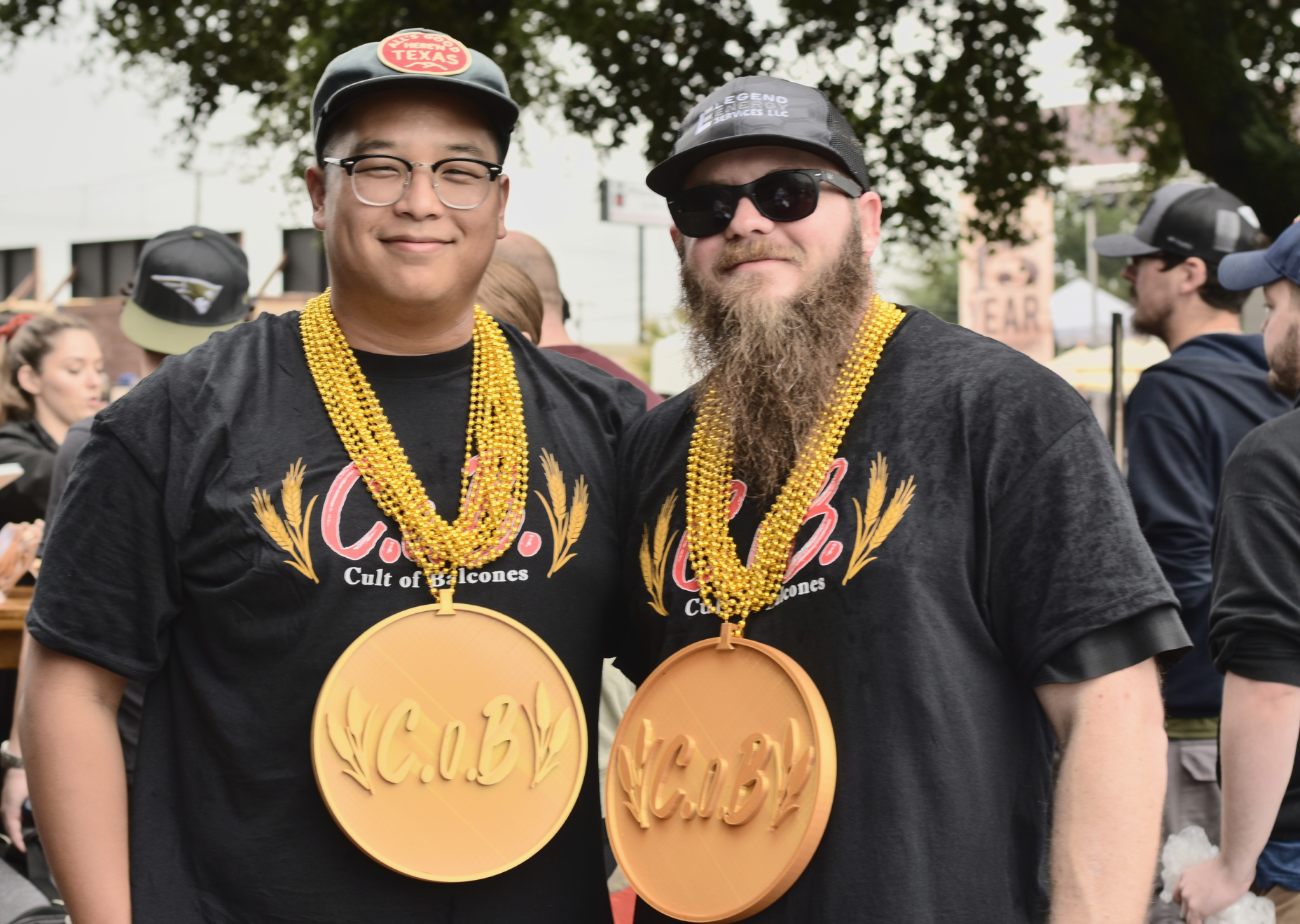 Two men smiling at camera