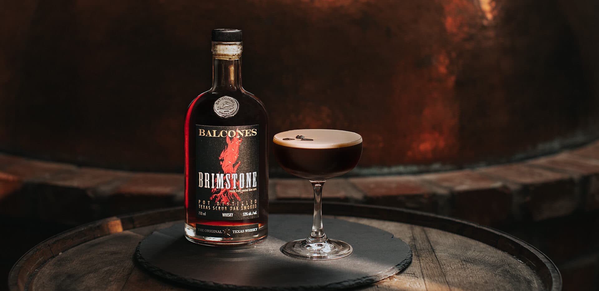 Bottle of Brimstone Smoked Whisky with Espresso Martinis on Table