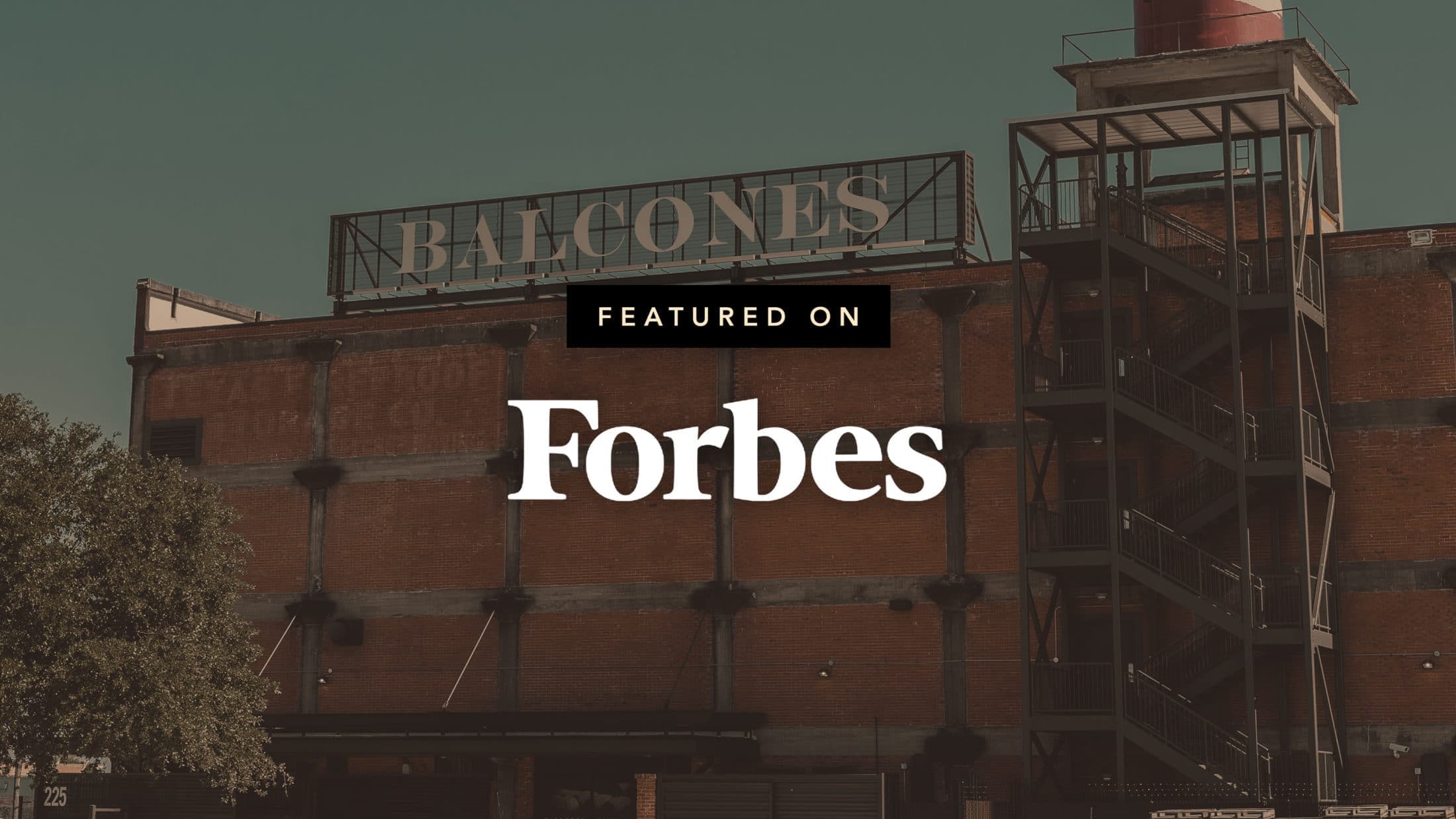 Outside of Balcones distillery with Forbes logo
